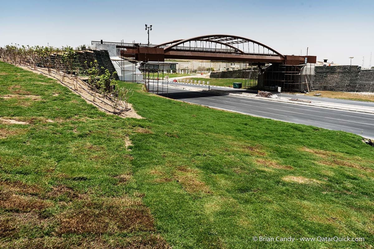 Green reinforced soil wall for approach to walkway at a park in Qatar
