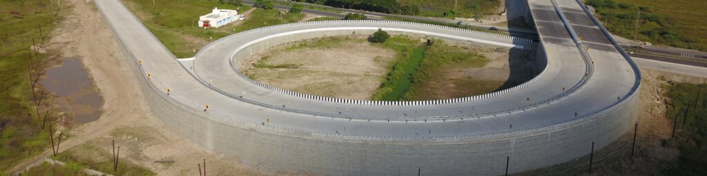 Curved reinforced soil wall for NH- 227 using StrataGrid geogrids and StrataBlock system