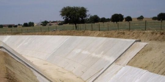 Drainage for channels using StrataDrain™ geocomposites by Strata Geosystems