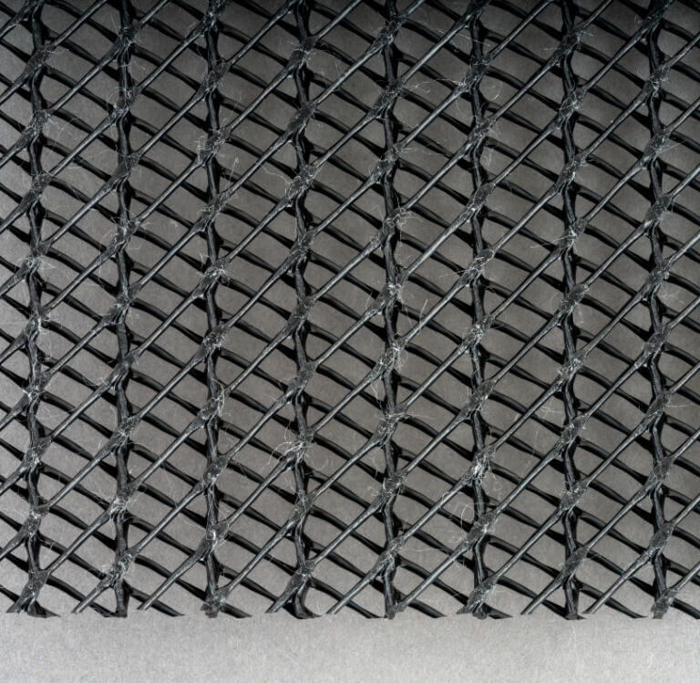 StrataDrain™ geocomposites by Strata Geosystems manufactured by the combination of geonets and geotextiles.